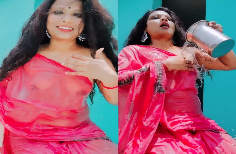 Hot Bhabi Showing Boobs Through Wet Saree